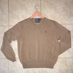 brown sweater with red embroidery